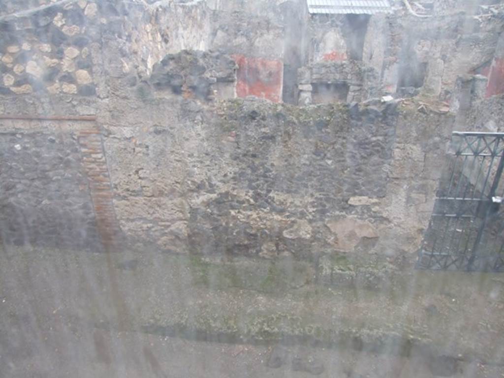 I.11.15 Pompeii. December 2007. 
Looking east out of upper floor window of room 18 over roadway, towards entrance at I.12.16.

