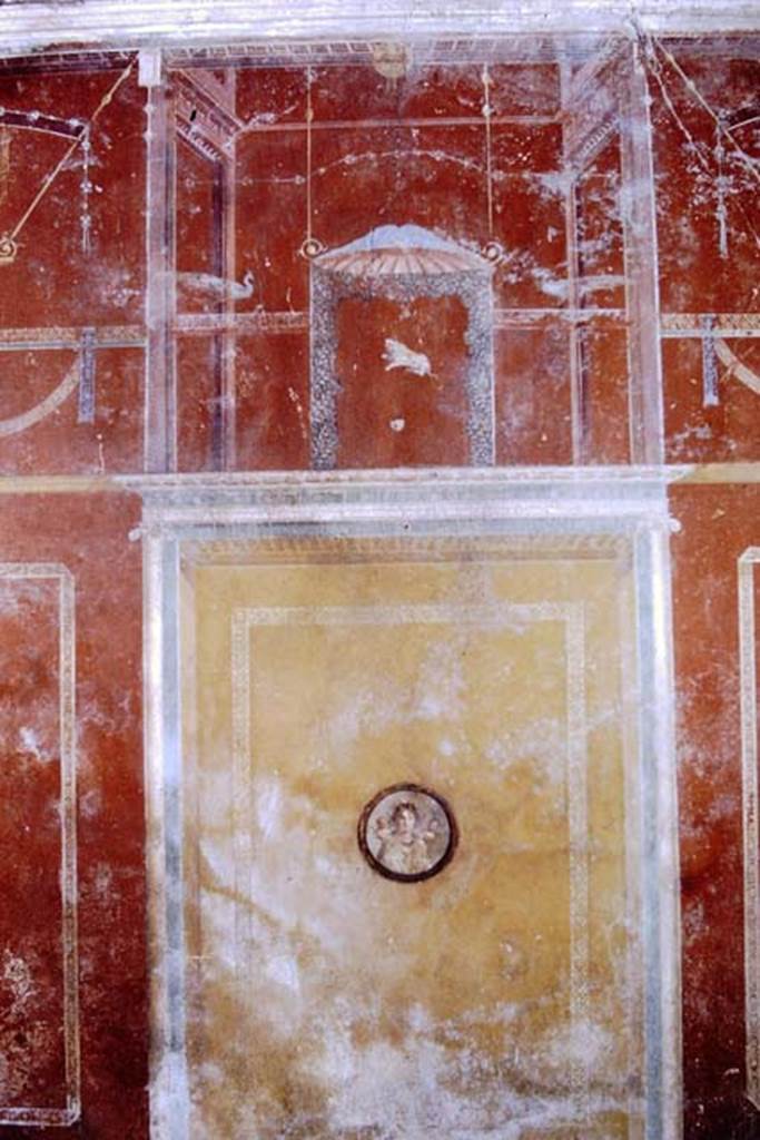 I.11.17 Pompeii. 1968. Room 3, detail from upper and middle of central panel of east wall of triclinium. Photo by Stanley A. Jashemski.
Source: The Wilhelmina and Stanley A. Jashemski archive in the University of Maryland Library, Special Collections (See collection page) and made available under the Creative Commons Attribution-Non Commercial License v.4. See Licence and use details.
J68f1302
