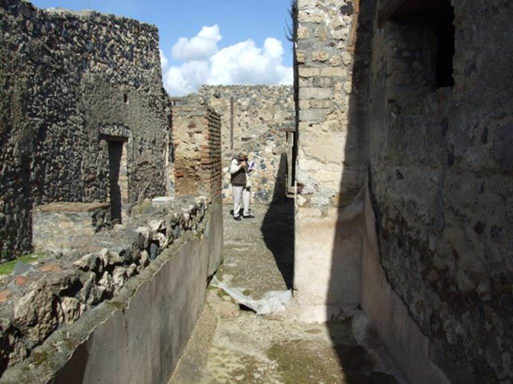 I.12.2 and I.12.1 Pompeii.  March 2009.  Room 14.  Looking north to room 11.