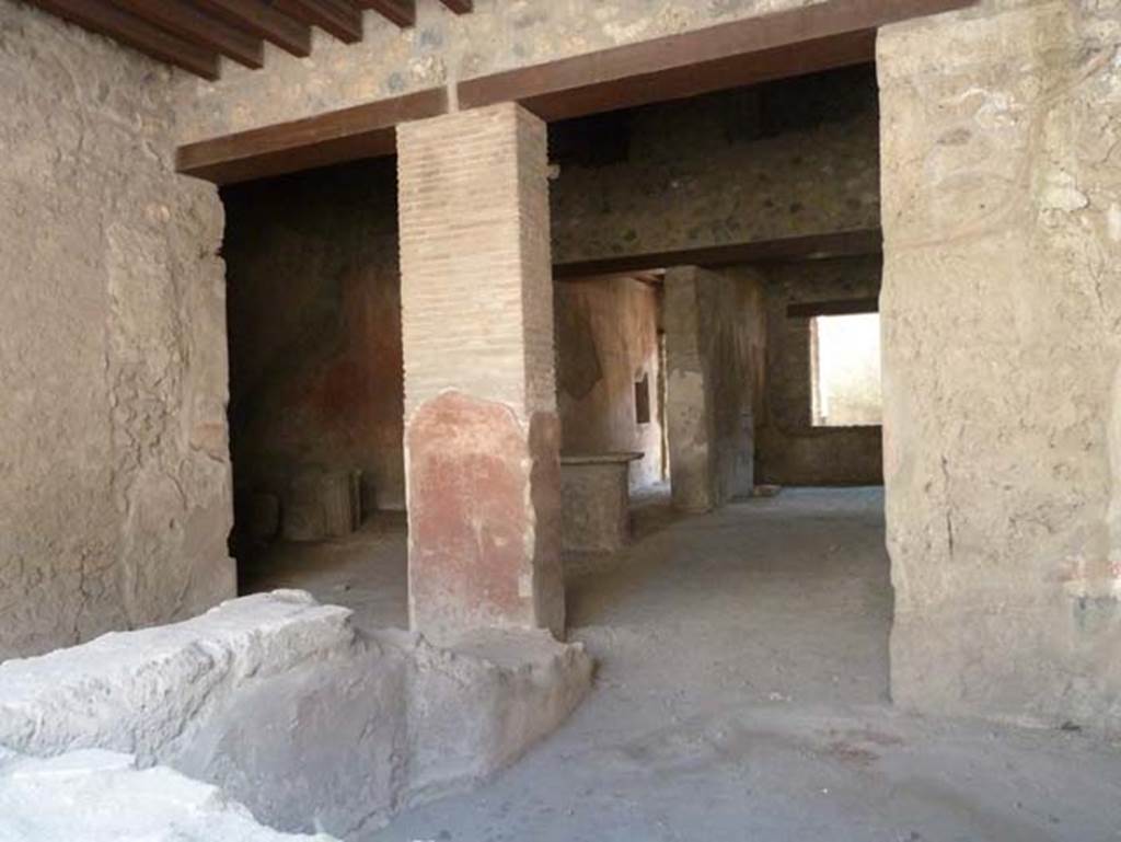 I.12.3 Pompeii. September 2015. Room 1, looking south across counter towards painted pilaster.