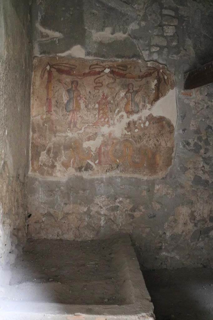 I.12.3 Pompeii. December 2018.
Room 4, looking towards east wall in kitchen with water basin. Photo courtesy of Aude Durand.