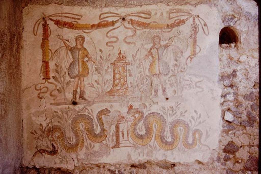 I.12.3 Pompeii. 1964. Room 4, lararium on east wall of kitchen. Photo by Stanley A. Jashemski.
Source: The Wilhelmina and Stanley A. Jashemski archive in the University of Maryland Library, Special Collections (See collection page) and made available under the Creative Commons Attribution-Non Commercial License v.4. See Licence and use details.
J64f1562