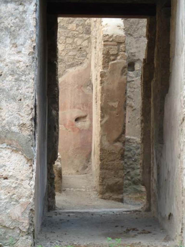 I.12.5 Pompeii. September 2015. Looking south through corridor to rear rooms and garden.