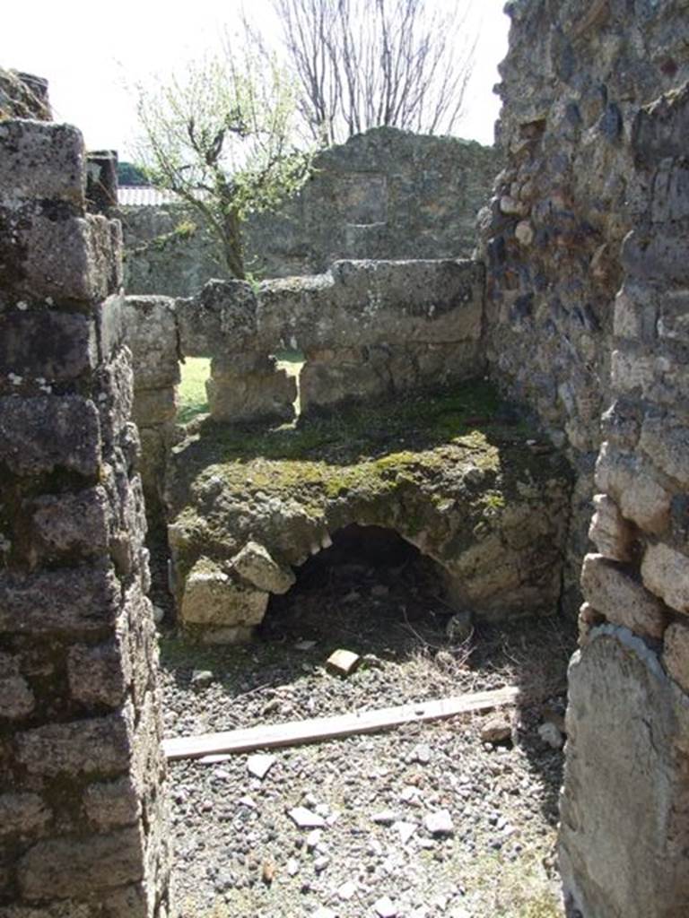 I.12.16 Pompeii. March 2009. Doorway to Room 5. Kitchen, on south side of small garden.