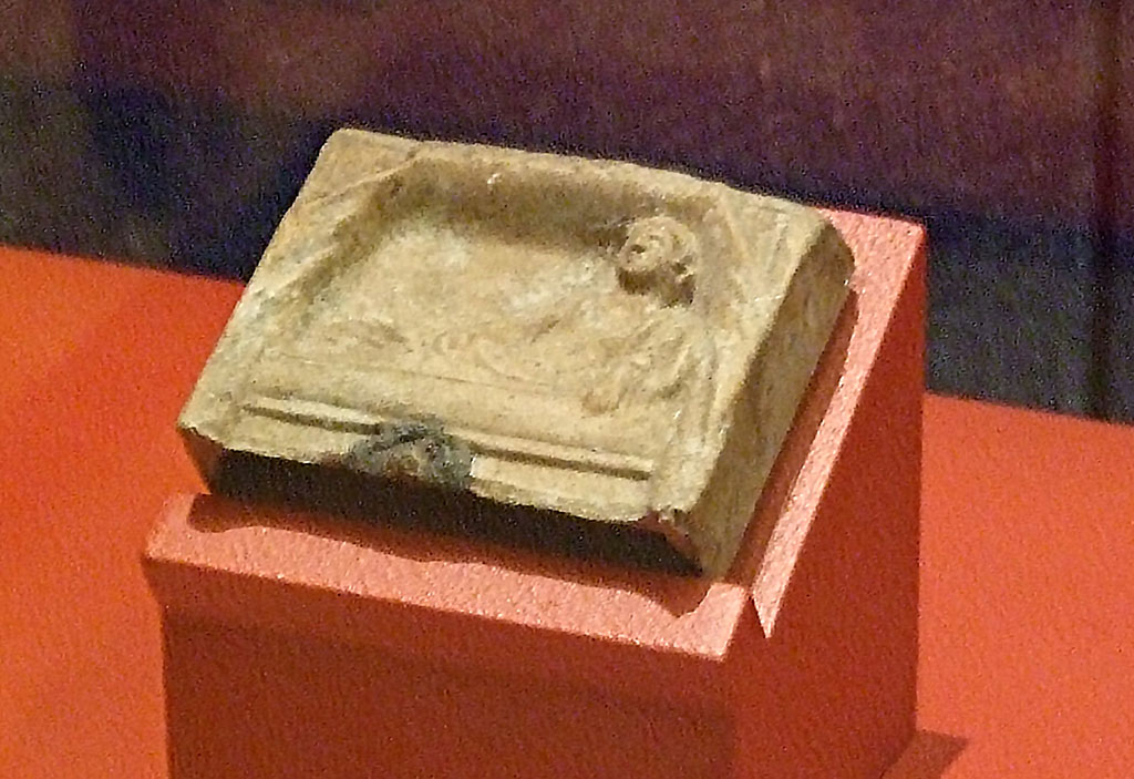 I.13.3 Pompeii. Terracotta relief of a reclining deity. SAP 11549. 
Photographed at A Day in Pompeii exhibition at Melbourne Museum. September 2009.
