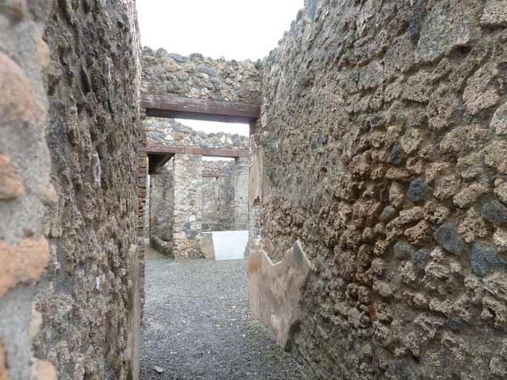 I.13.4 Pompeii. May 2010. Looking south along west wall of entrance corridor.