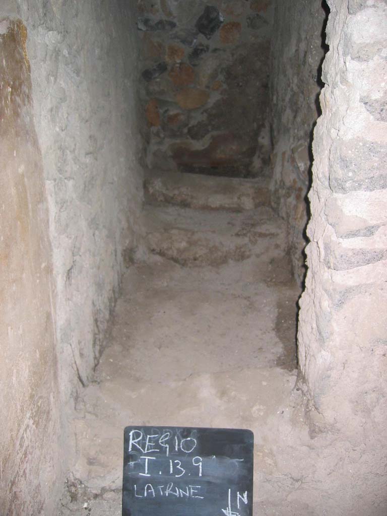 I.13.9 Pompeii. July 2008.
Looking south into latrine, in south-east corner of atrium. Photo courtesy of Barry Hobson.