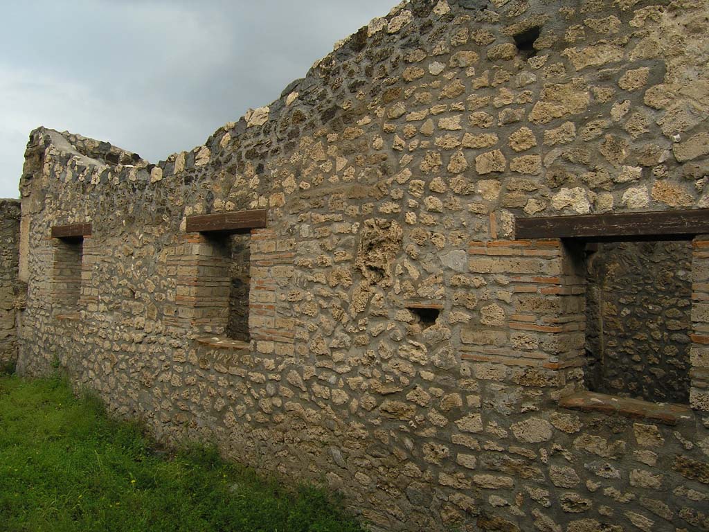 I.14.2 Pompeii. July 2008. Area G, looking east along north wall. Photo courtesy of Guilhem Chapelin. 

