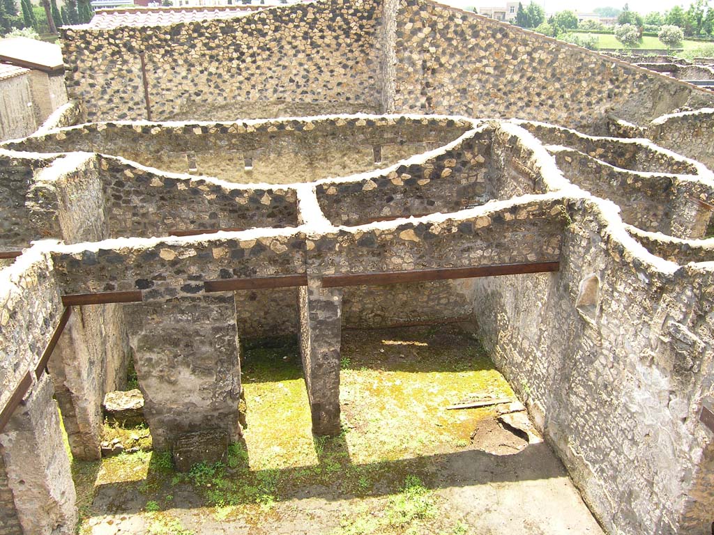 I.14.2 Pompeii. July 2008. Looking south across atrium to rooms E and F, with room G at rear.
Photo courtesy of Guilhem Chapelin. 
