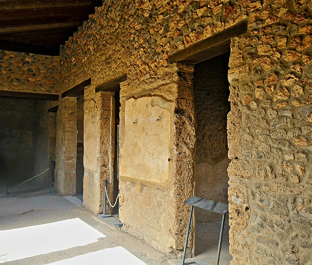 I.15.3 Pompeii. September 2024. Looking west along north side of portico 10 of peristyle 13. Photo courtesy of Giuseppe Ciaramella.