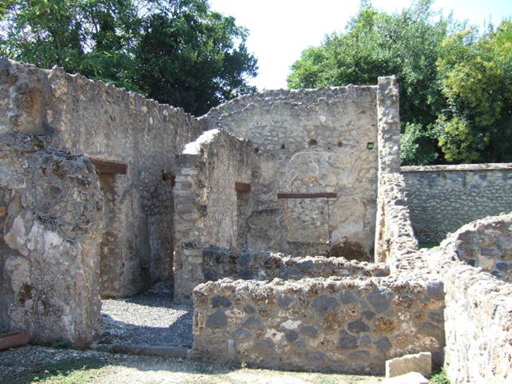 I.16.5 Pompeii. September 2005. Looking west to rooms in south-west corner.