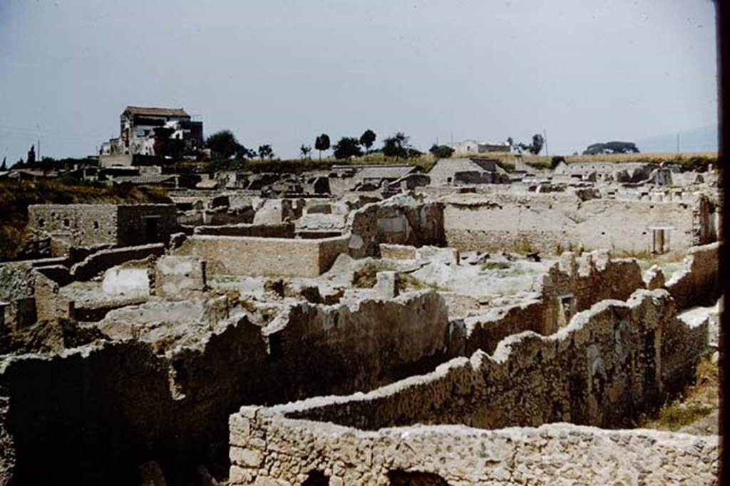 I.16.7 Pompeii. 1959. Looking north-west across I.16. 1.16.7 is the doorway in the road (centre right), with the painted no.7. Photo by Stanley A. Jashemski, from the south-west corner of I.15..
Source: The Wilhelmina and Stanley A. Jashemski archive in the University of Maryland Library, Special Collections (See collection page) and made available under the Creative Commons Attribution-Non Commercial License v.4. See Licence and use details.
J59f0459
