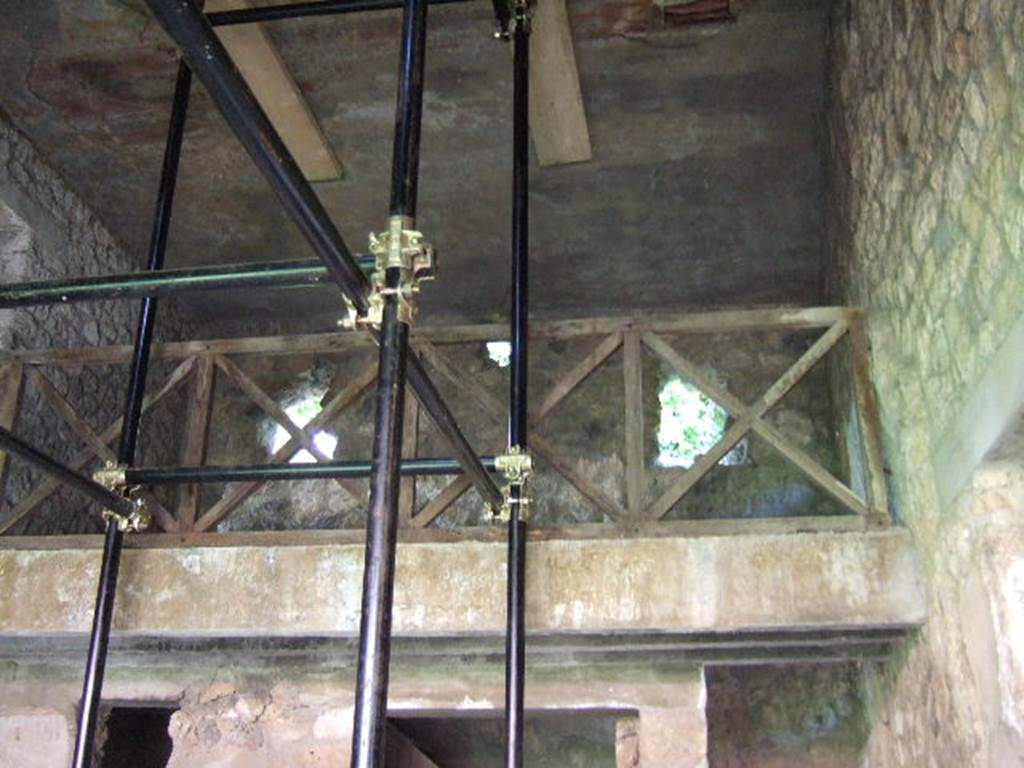 I.17.4 Pompeii.  May 2006. Open area or yard on south side of peristyle garden.  Reconstructed wooden upper gallery.
