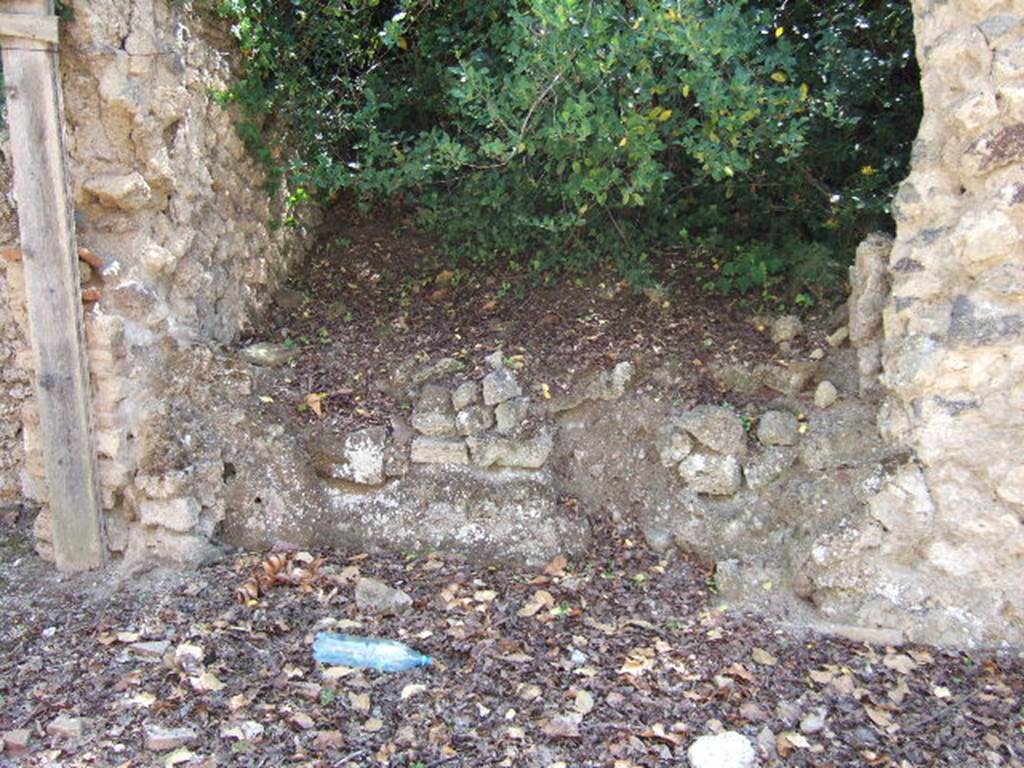 I.19.2 Pompeii. September 2005. Entrance doorway, looking south.
According to Hunink, graffito naming Actius was found on the counter of I.11.2 [=I.19.2]
<B=H>onus deus hic (h)abitat in do/mo / Act(i)      [CIL IV, 8417]
He translates this as A good god lives here in the house of Actius.
See Hunink, V., 2011. Glcklich ist dieser Ort!: 1000 Graffiti aus Pompeji. Stuttgart: Philipp Reclam, p. 60 no. 101.