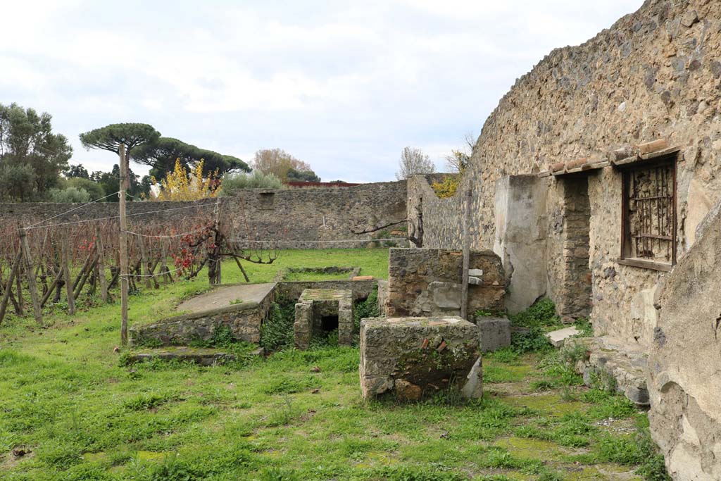 I.20.1 Pompeii. December 2018. Looking west towards triclinium, the doorway on the right is from I.20.2. Photo courtesy of Aude Durand.