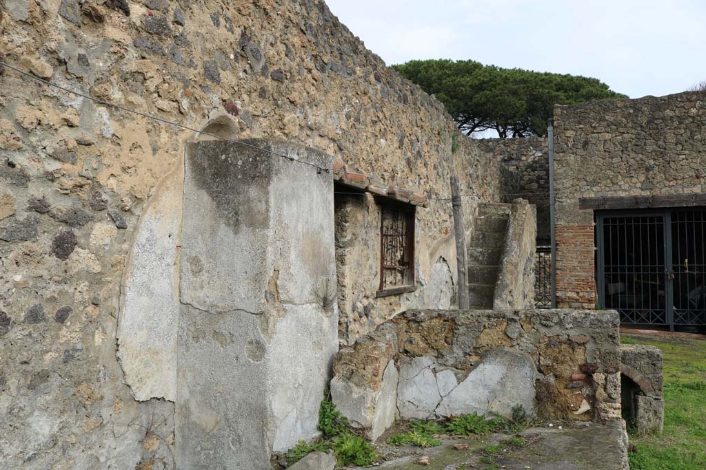 I.20.1 Pompeii. December 2018.
Looking towards north-east corner, across triclinium towards stairs to upper floor, at rear. Photo courtesy of Aude Durand.
