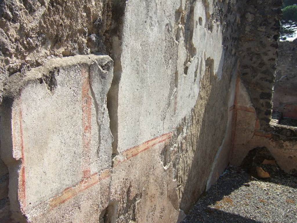 I.21.5 Pompeii. September 2005. East wall of tablinum, looking south.