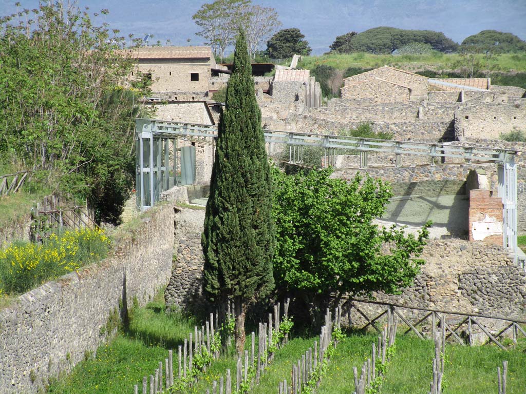 I.22.1 Pompeii. April 2019. Blue girders cover the area of I.22.1. Photo courtesy of Rick Bauer.
