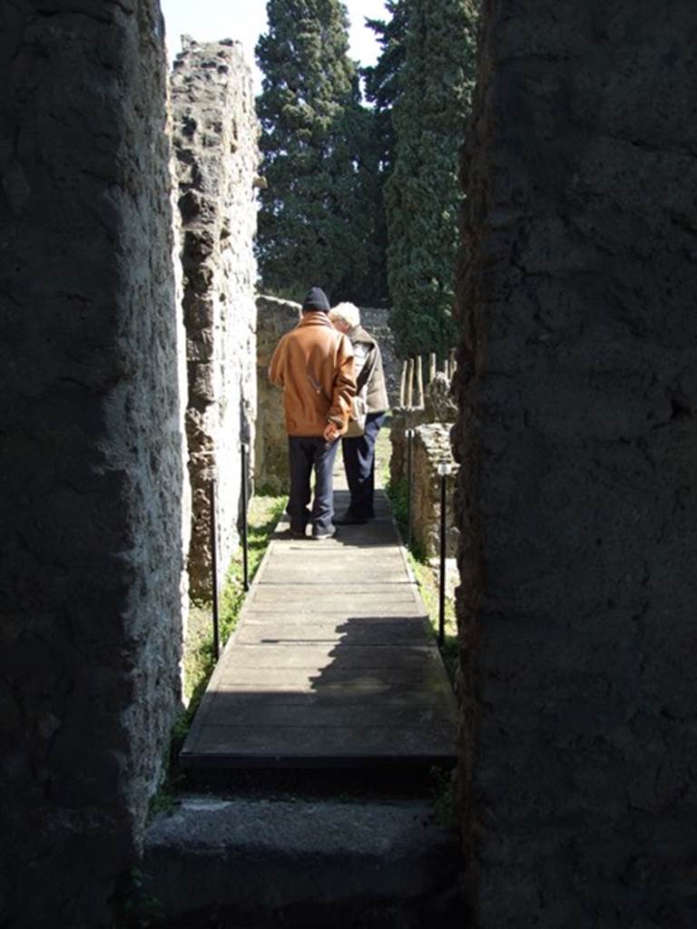 II.1.9 Pompeii.  March 2009.  Corridor leading to rear.