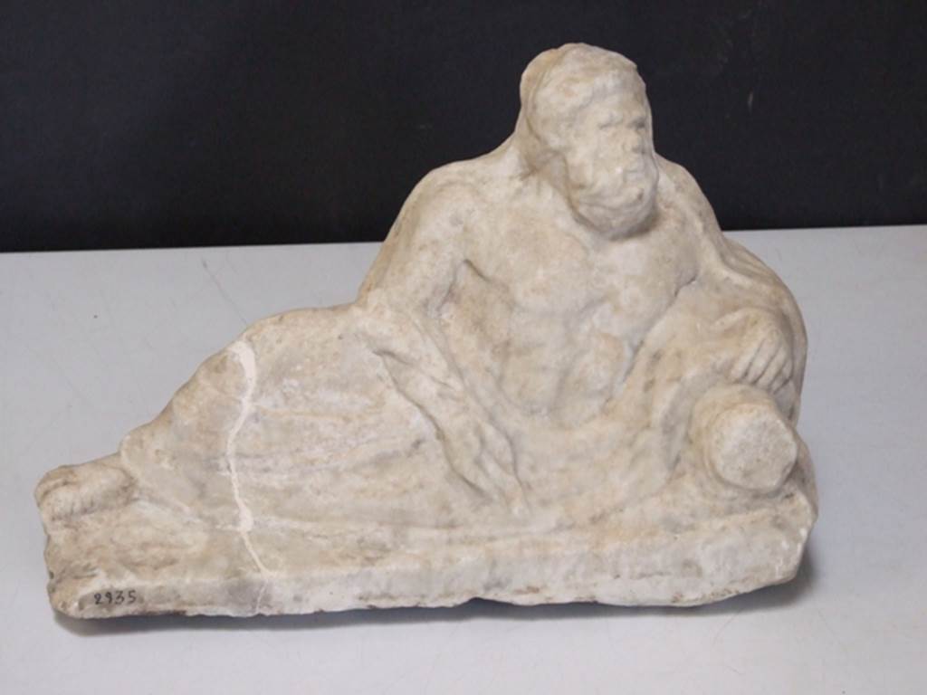 II.2.2. Pompeii. March 2009. Room “k”. White marble statuette of a river god. Found on the east side of the upper euripus near the Biclinium in the garden in 1920.  SAP inventory number: 2935.