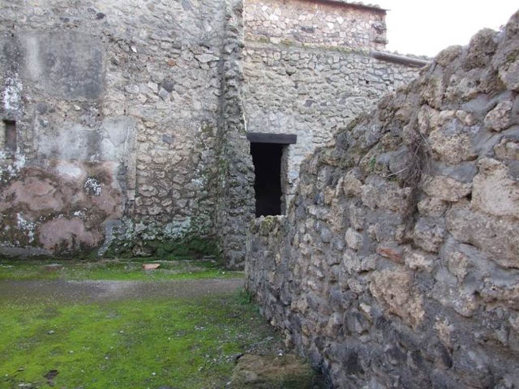 II.3.2.  South and west walls with doorway to rooms on the west side.