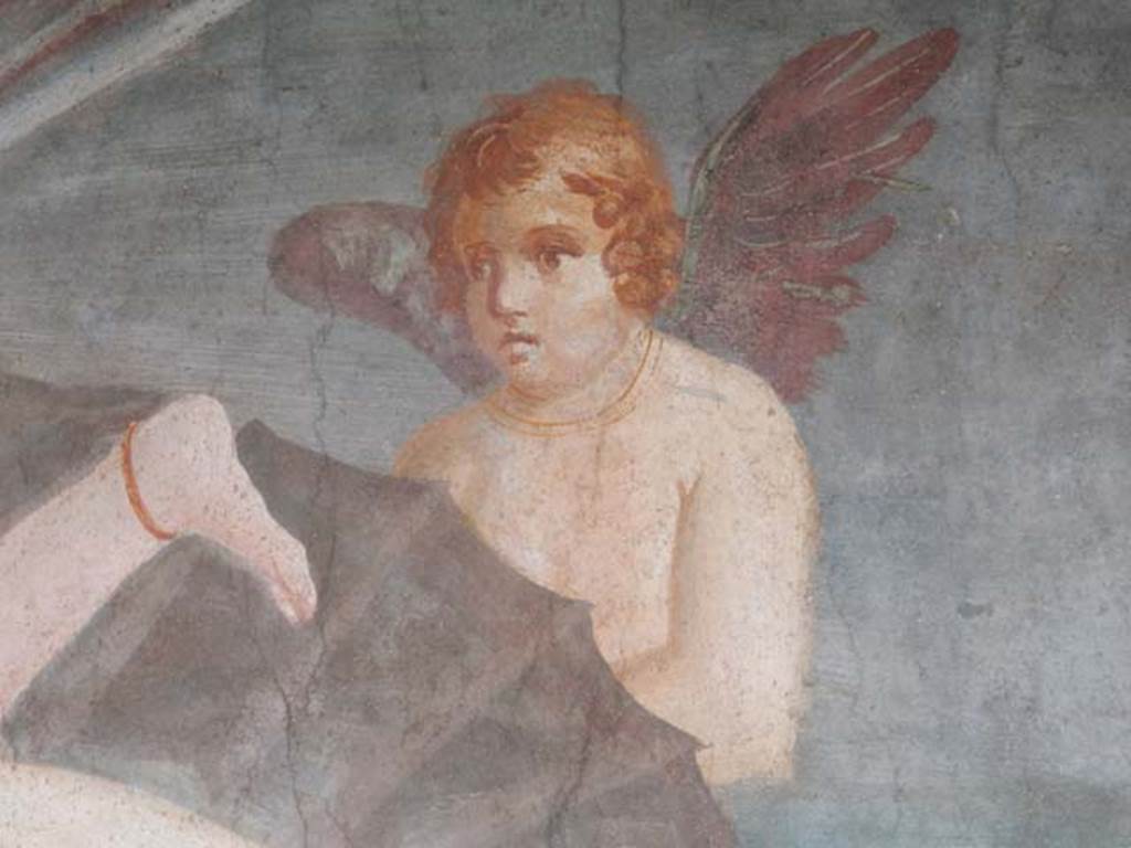II.3.3 Pompeii. May 2016. Room 11, detail of cupid/amorino supporting the shell of Venus/Aphrodite.
Photo courtesy of Buzz Ferebee.

