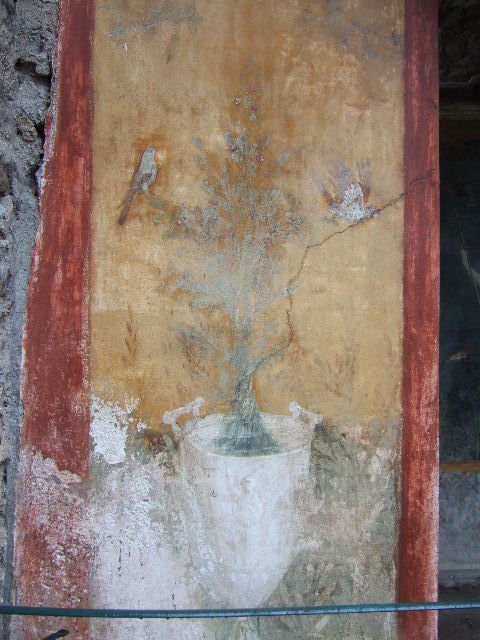 II.3.3 Pompeii. December 2006. Room 17, exterior north side of Sacellum. 
Wall painting of goblet with jet of water and birds.


