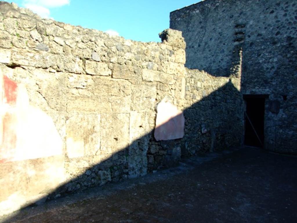 II.3.3 Pompeii. March 2009. Room 2, east wall of atrium.