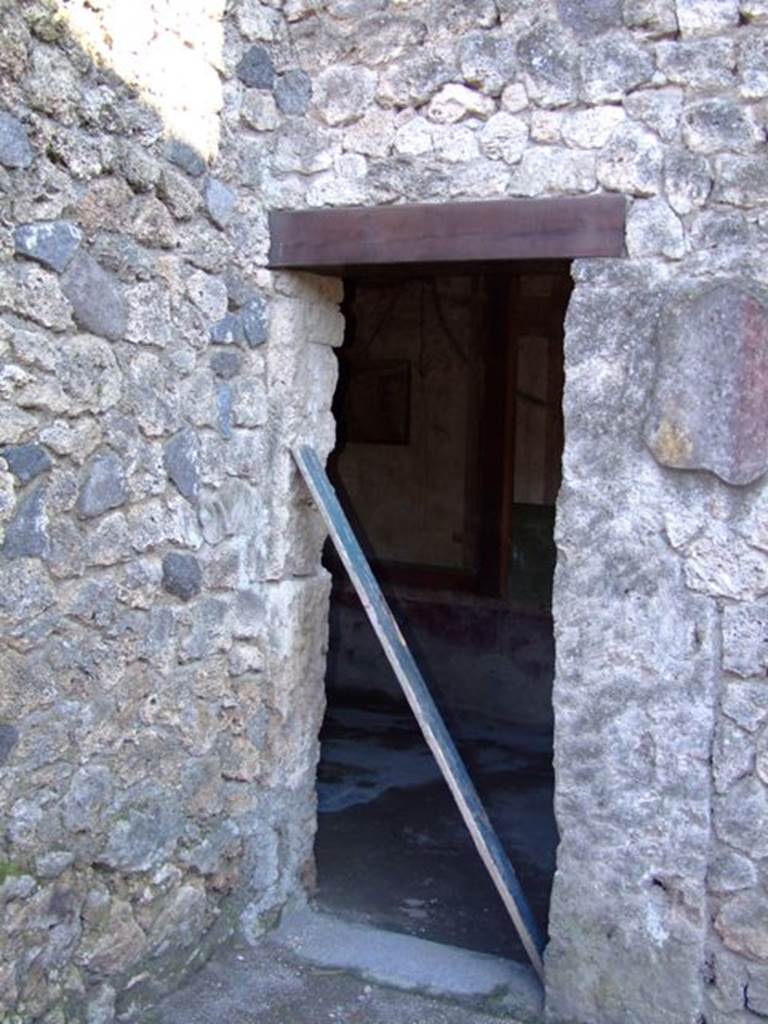 II.3.3 Pompeii.  March 2009.  Doorway to Room 4.