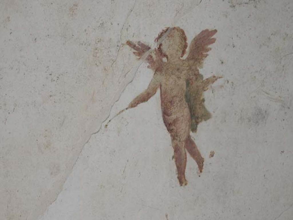 II.3.3 Pompeii. March 2009. Room 4, south wall of cubiculum, with painting of flying cherub.