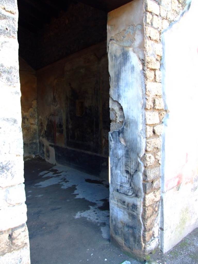 II.3.3 Pompeii.  March 2009. Doorway of Room 6, North side.