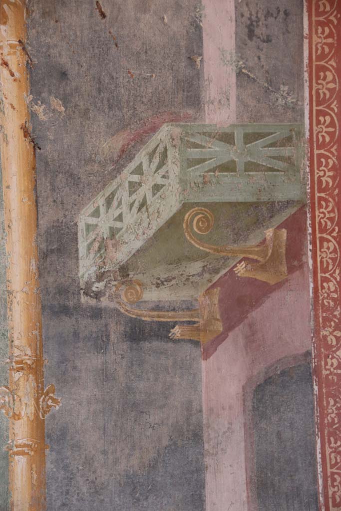 II.3.3 Pompeii. September 2017. Room 6, detail of painted balcony from west end of centre of south wall of triclinium. 
Photo courtesy of Klaus Heese.

