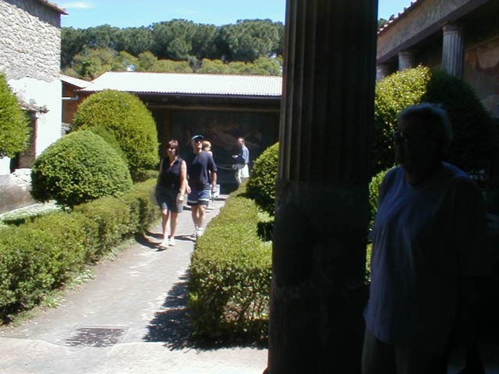 II.3.3 Pompeii.  Room 11, North Portico.  Looking south towards rear wall of Garden.  
