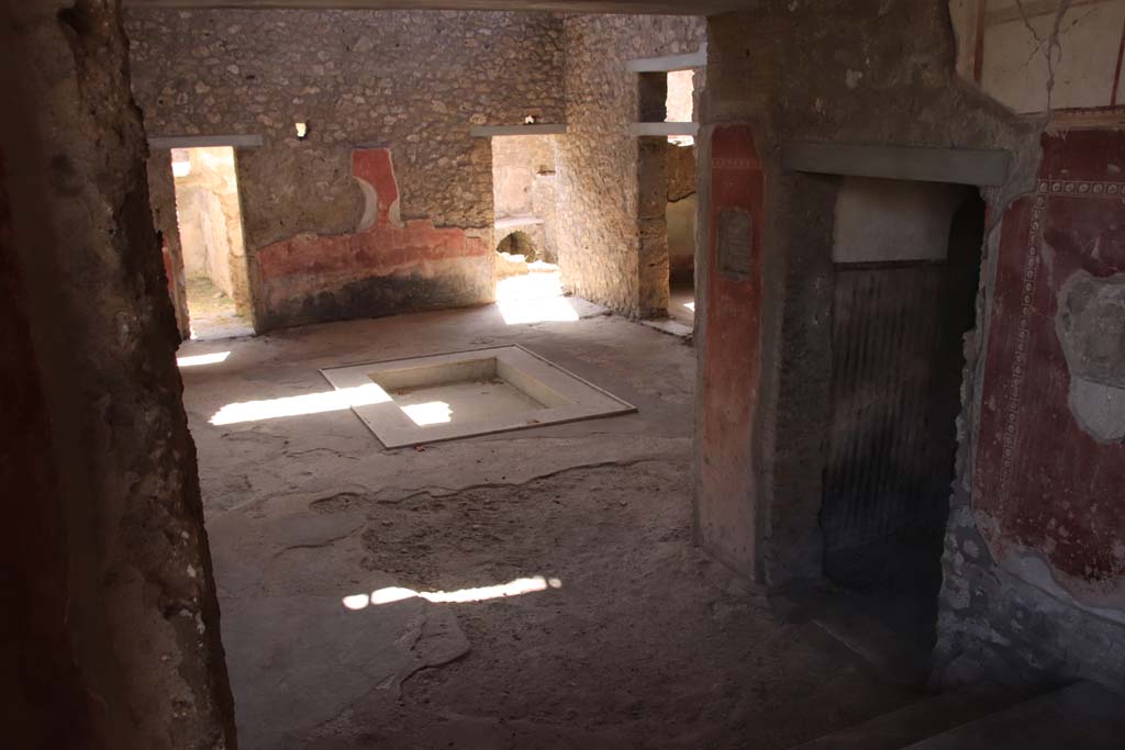 II.4.10 Pompeii. September 2019. Looking towards south-west corner of atrium, and west side.
Photo courtesy of Klaus Heese.


