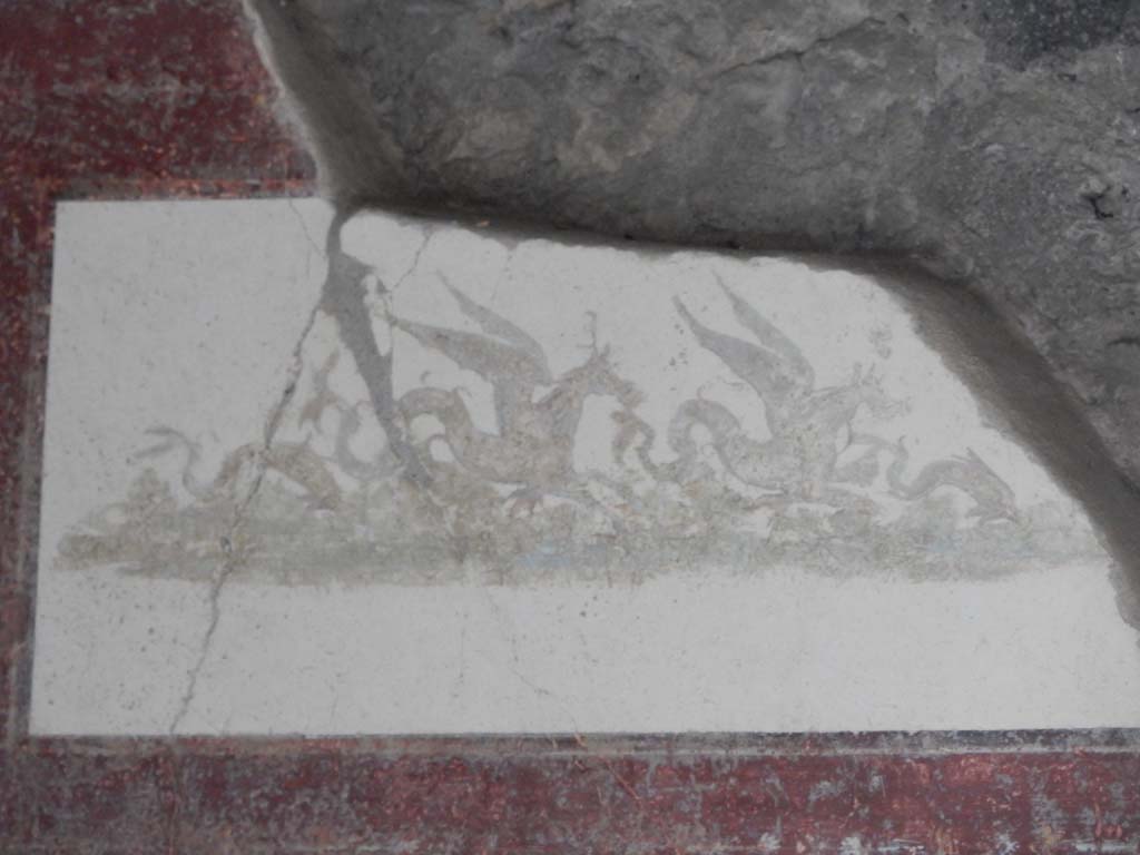 II.4.10 Pompeii. June 2019. Biclinium, detail of panel on south wall. Photo courtesy of Buzz Ferebee.   