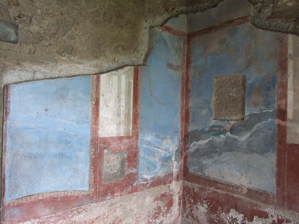 II.4.10 Pompeii. December 2006. Biclinium, west wall, north-west corner and north wall.