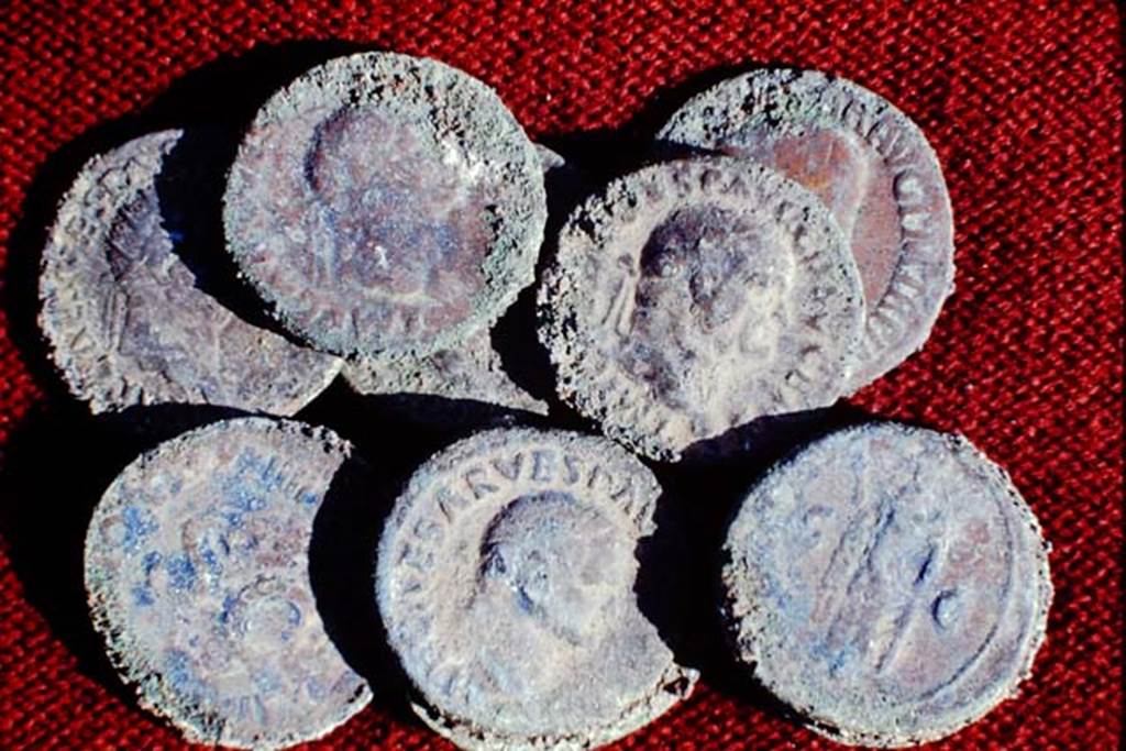 II.5 Pompeii, 1968. Coins found.  Photo by Stanley A. Jashemski.
Source: The Wilhelmina and Stanley A. Jashemski archive in the University of Maryland Library, Special Collections (See collection page) and made available under the Creative Commons Attribution-Non Commercial License v.4. See Licence and use details.
J68f1732
