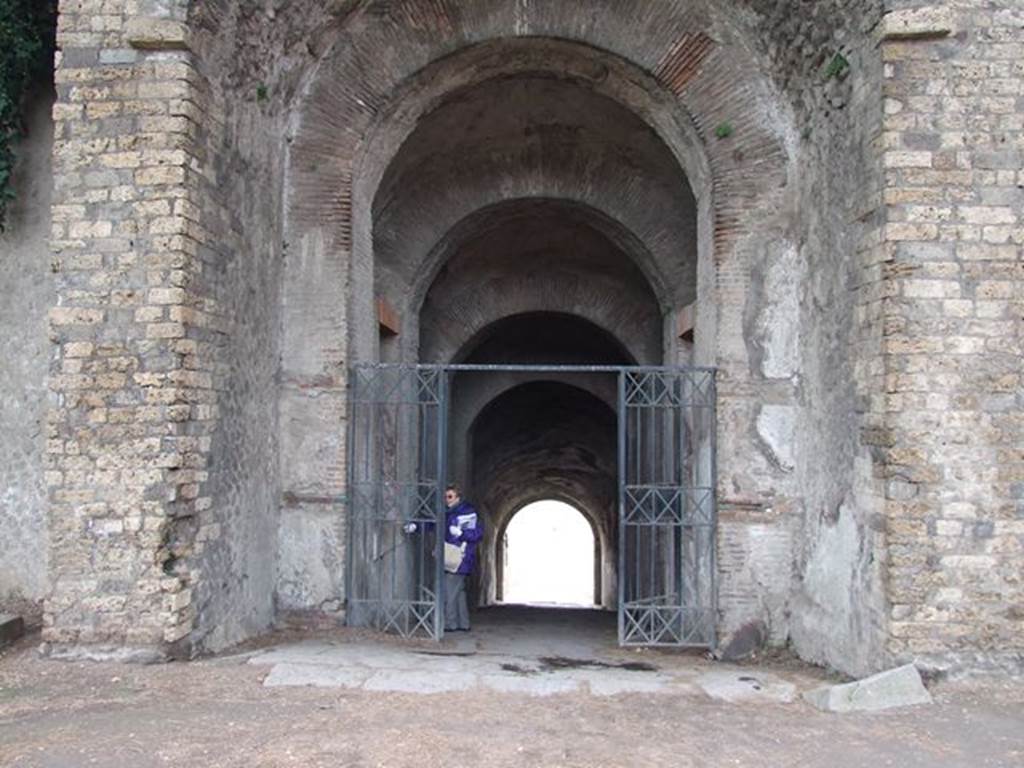 II.6 Pompeii. December 2006. Amphitheatre, northern entrance.   
According to Pagano and Prisciandaro, on 29th December 1814 (PAH III, 1) 3 skeletons were found near the doorway that lead to the arena.  
Near to them were two gold armbands with head of a serpent, a bracelet, a ring with head of serpent, and a piece of chain used as a bootlace (un pezzo di cateniglia ad uso di laccettino). See Pagano, M.  and Prisciandaro, R., 2006. Studio sulle provenienze degli oggetti rinvenuti negli scavi borbonici del regno di Napoli.  Naples : Nicola Longobardi. 
(p.110)

