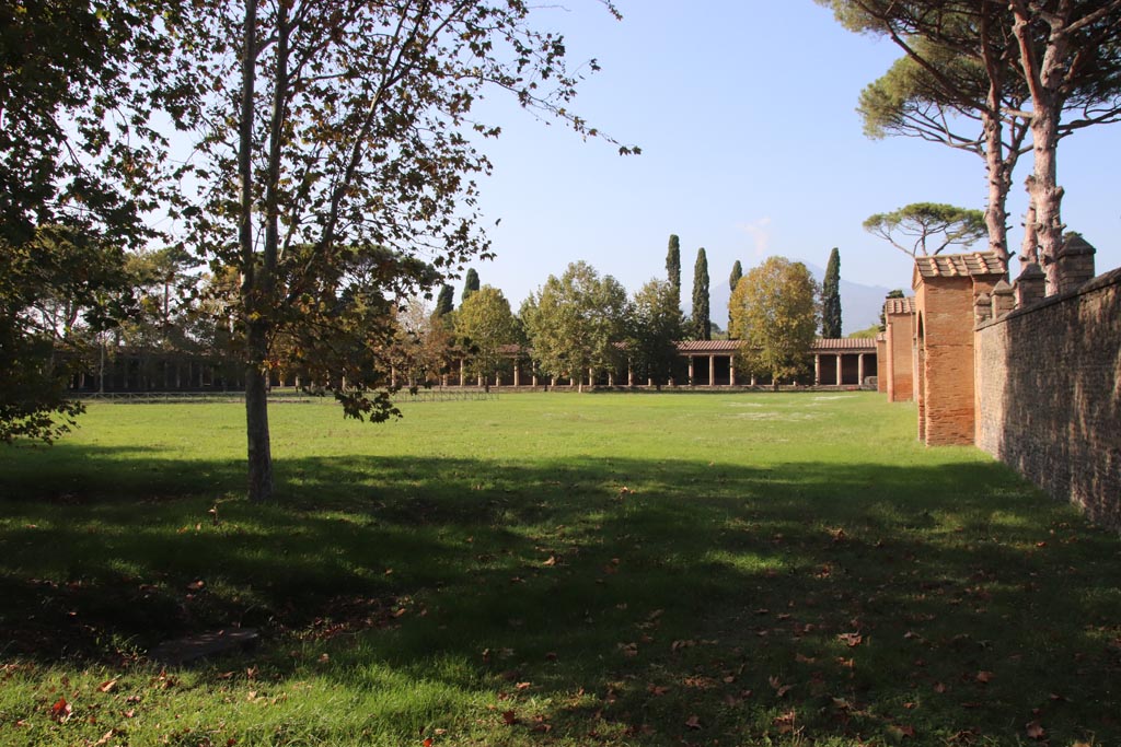 II.7.1 Pompeii. Palaestra. October 2023. Looking north along interior east side. Photo courtesy of Klaus Heese.