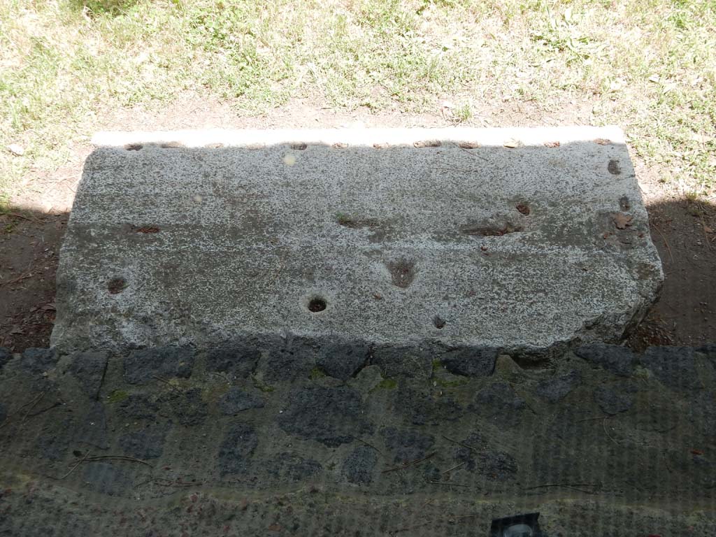 II.7 Pompeii. June 2019. Stone block. Photo courtesy of Buzz Ferebee.