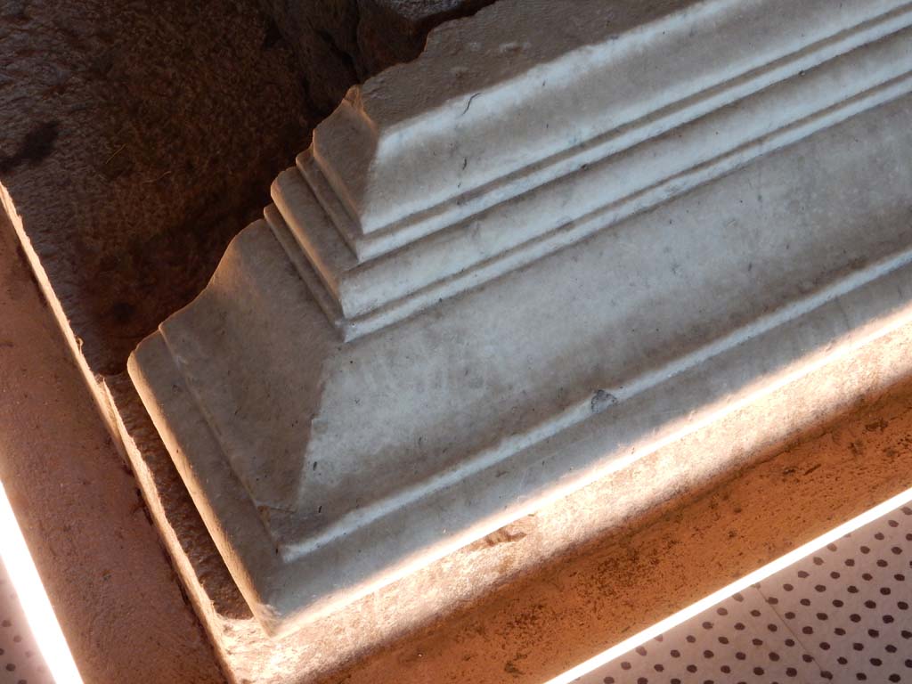 II.7.9a Pompeii. June 2019. Marble base at south end of altar. Photo courtesy of Buzz Ferebee.