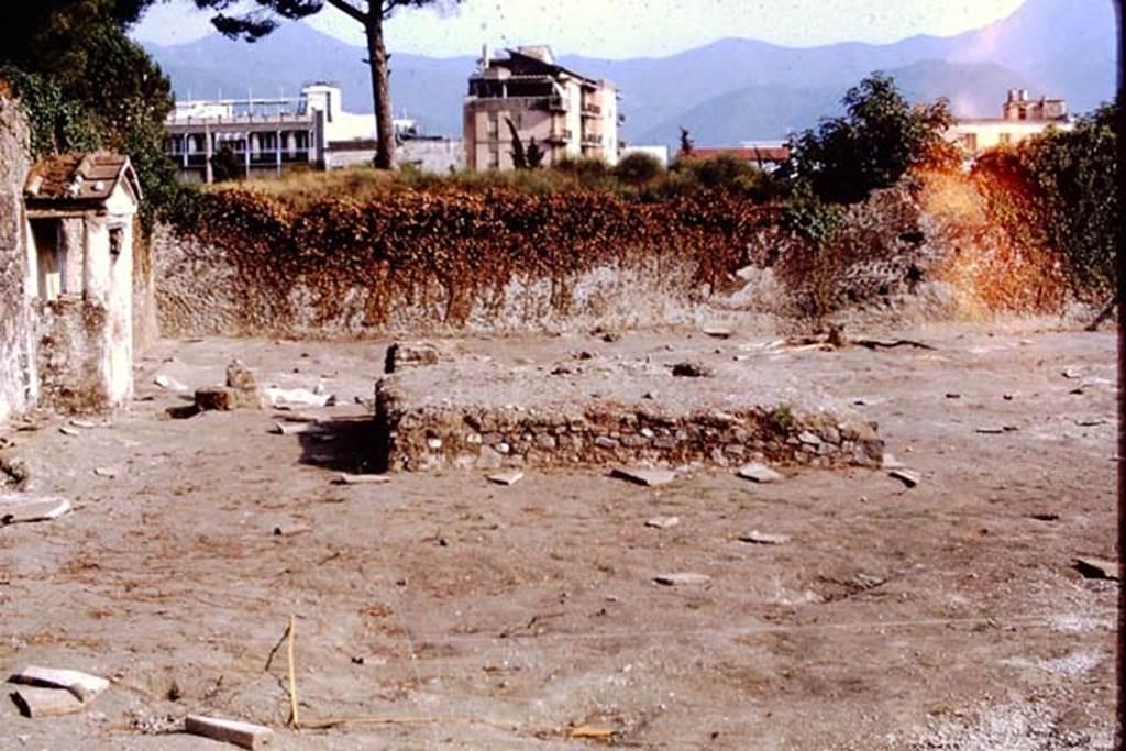 II.8.6 Pompeii, 1973. Looking south towards lararium and triclinium towards the south-east. Photo by Stanley A. Jashemski. 
Source: The Wilhelmina and Stanley A. Jashemski archive in the University of Maryland Library, Special Collections (See collection page) and made available under the Creative Commons Attribution-Non Commercial License v.4. See Licence and use details. J73f0516
