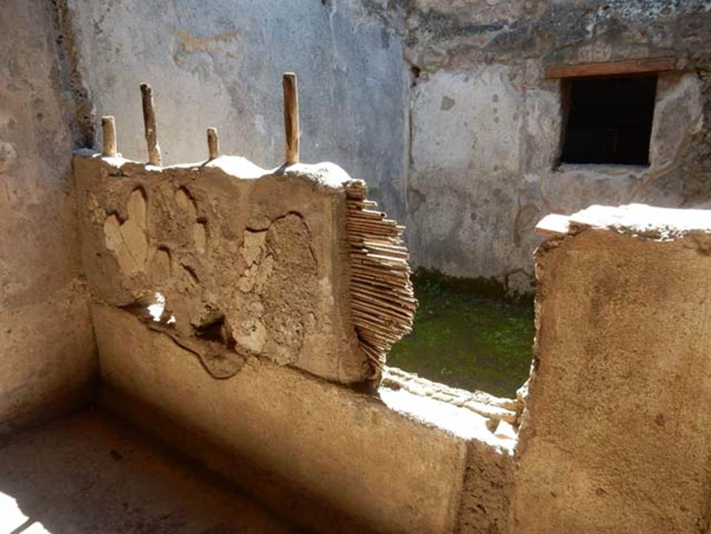 II.9.5 Pompeii, May 2018. Room 4, west wall (made from wood and plaster). Photo courtesy of Buzz Ferebee.