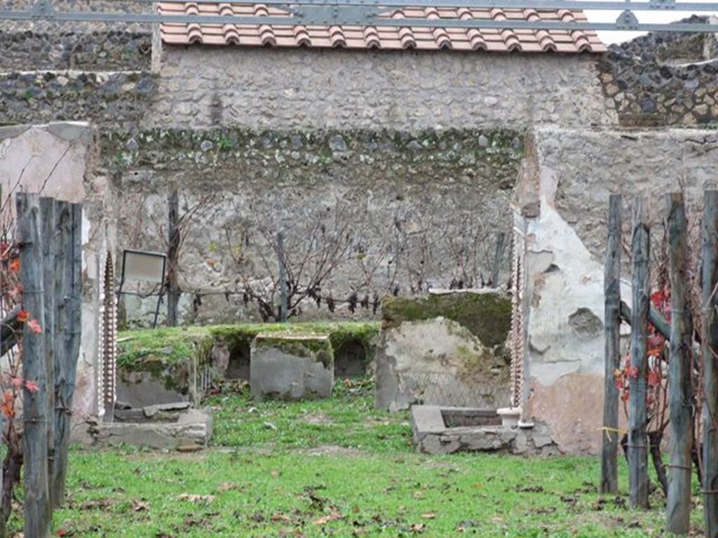 II.9.7 Garden entrance to House of Summer Triclinium.    December 2006.  Triclinium and twin mosaic fountains.