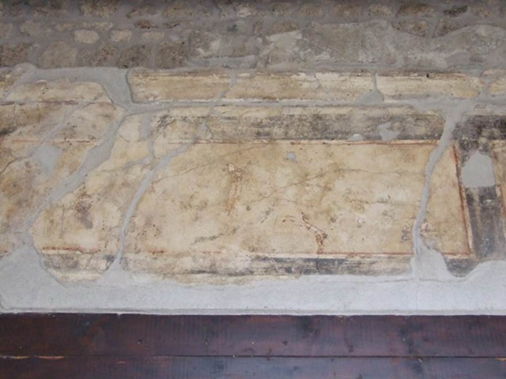 III.2.1 Pompeii.  March 2009.  Room 9.  Tablinum. North wall above window.  West side.