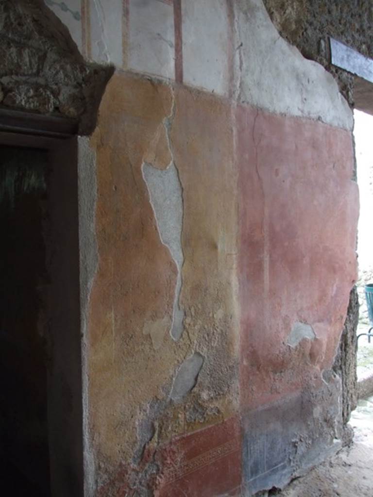 III.4.b. Pompeii.  March 2009.  Portico area.  Painted wall between rooms 5 and 6.