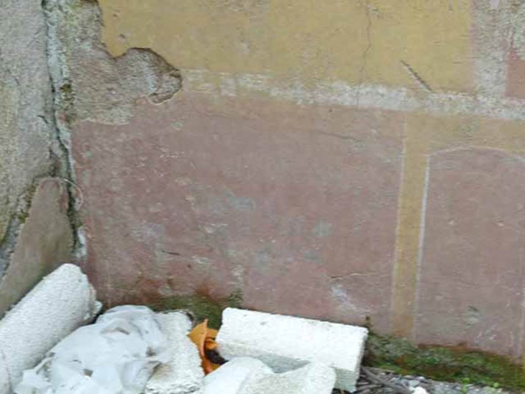 III.8.4 Pompeii. May 2010. Detail of painted decoration on north wall.