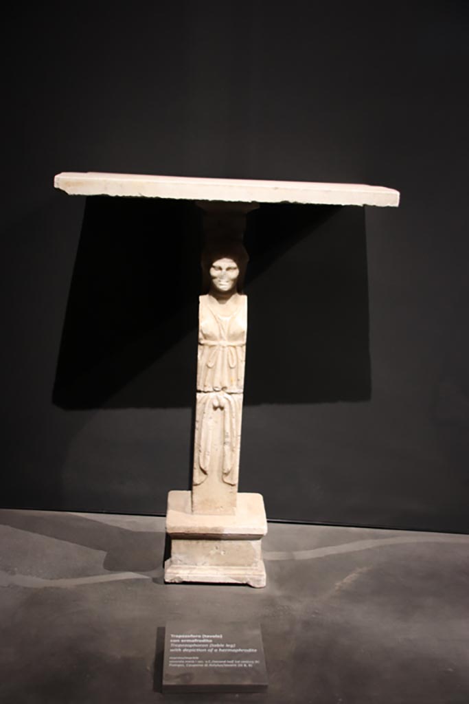 III.8.8 Pompeii. October 2022. 
Marble table-leg depicting an hermaphrodite, according to NdS – found near the west wall.
Photo courtesy of Klaus Heese.
