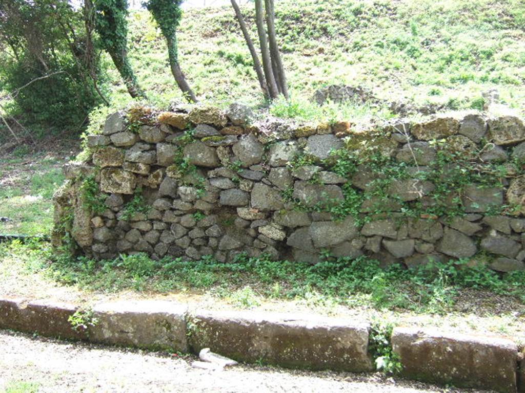 III.10.3 Pompeii. May 2006.   Wall on east side of entrance, originally with a window.  III.10.4 can be seen on the left. 