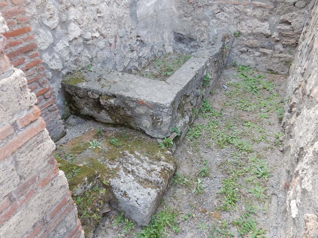 V.1.4 Pompeii. June 2019. Looking towards west side of rear room through doorway.
Photo courtesy of Buzz Ferebee.